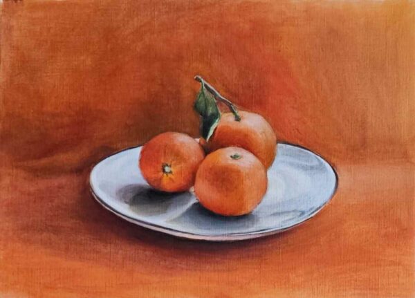 Mandarini su sfondo arancio